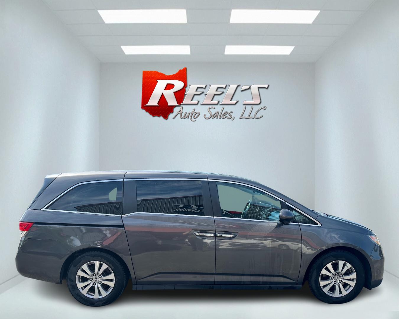 2015 Gray /Grey Honda Odyssey EX-L (5FNRL5H67FB) with an 3.5L V6 SOHC 24V engine, 6-Speed Automatic transmission, located at 547 E. Main St., Orwell, OH, 44076, (440) 437-5893, 41.535435, -80.847855 - Photo#4